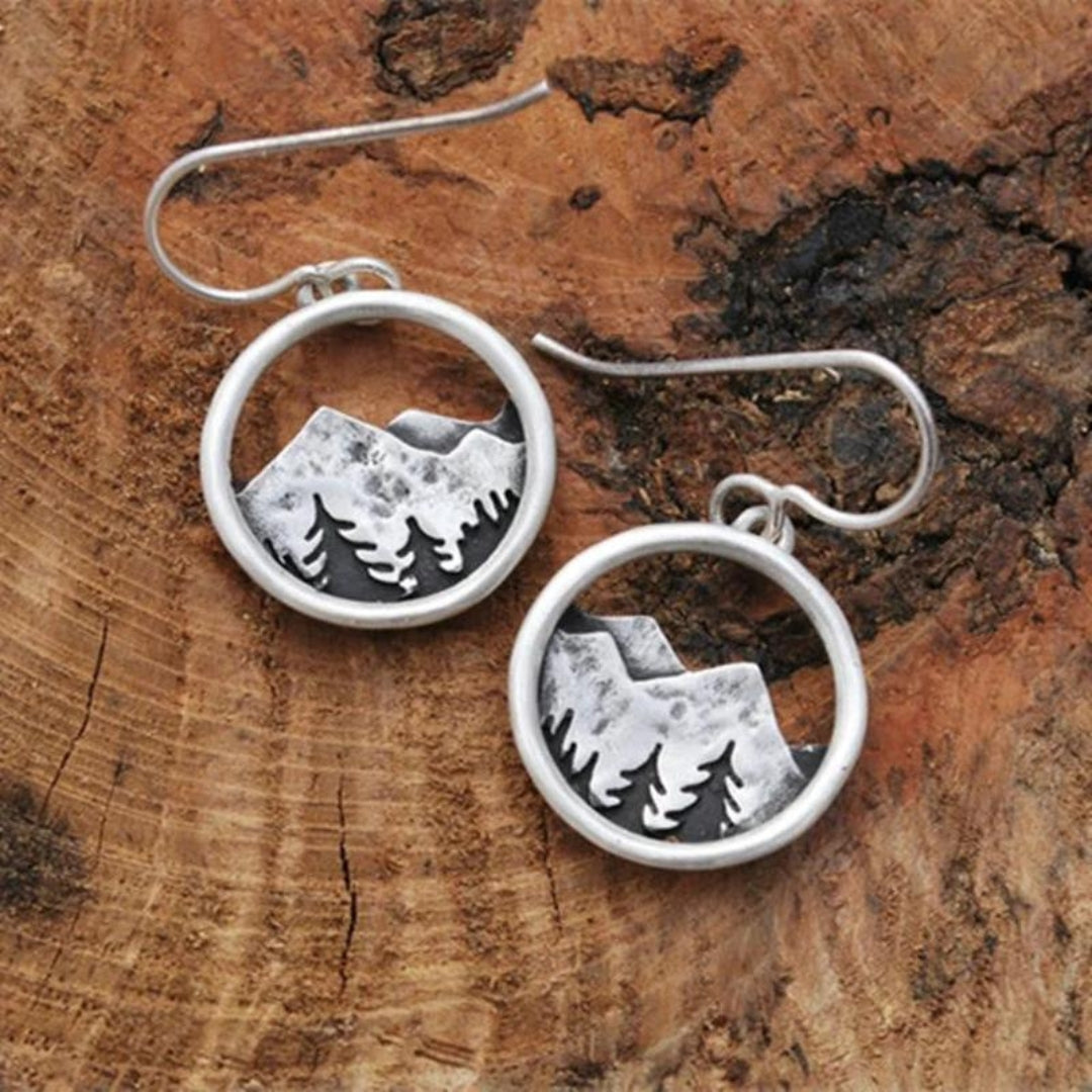Boucles d'oreilles bohèmes argentées avec motif montagne