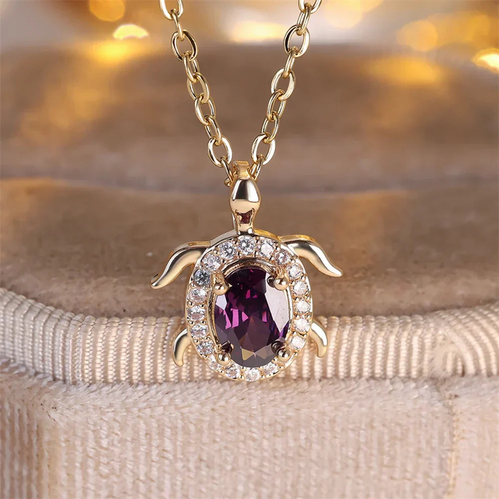 Collier pendentif tortue en cristal violet