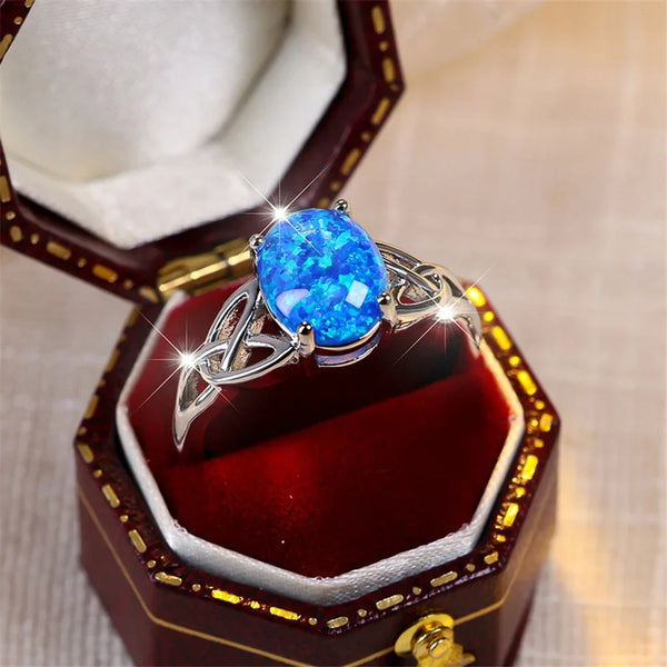 Bague vintage en argent et opale bleue