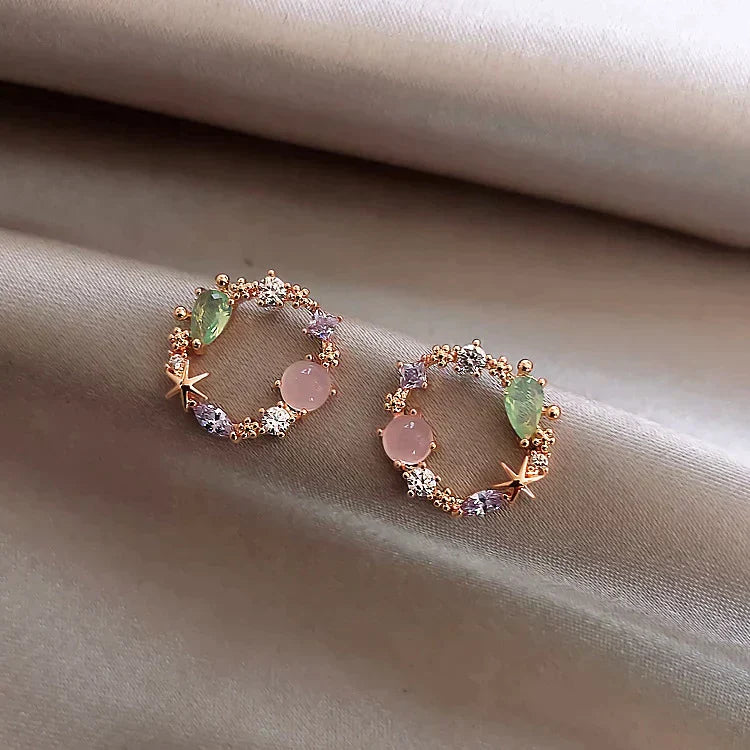 Boucles d'oreilles florales en cristal or rose