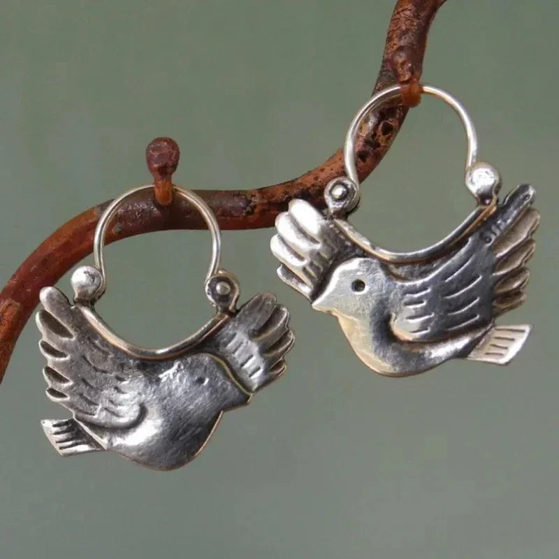 Boucles d'oreilles pendantes d'inspiration bohème – Ton argenté