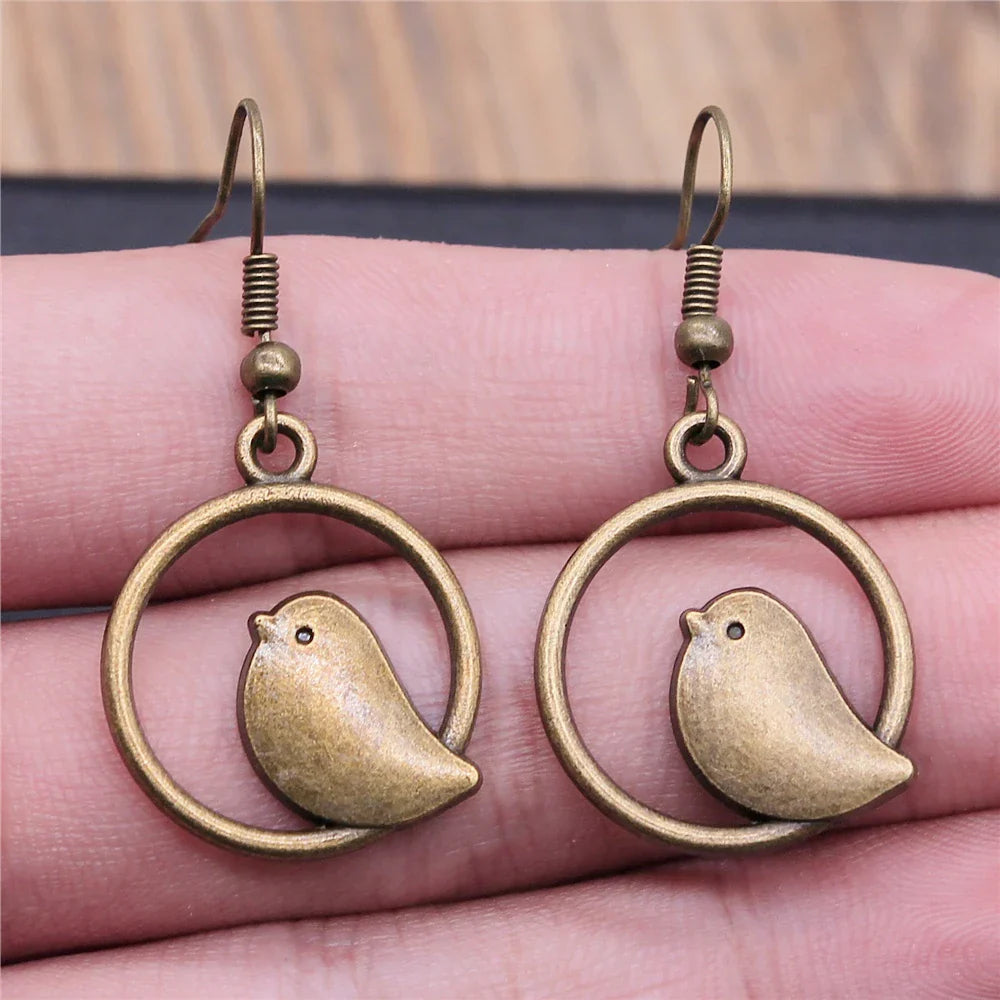 Boucles d'oreilles pendantes breloque oiseau vintage – Bijoux bohèmes faits main