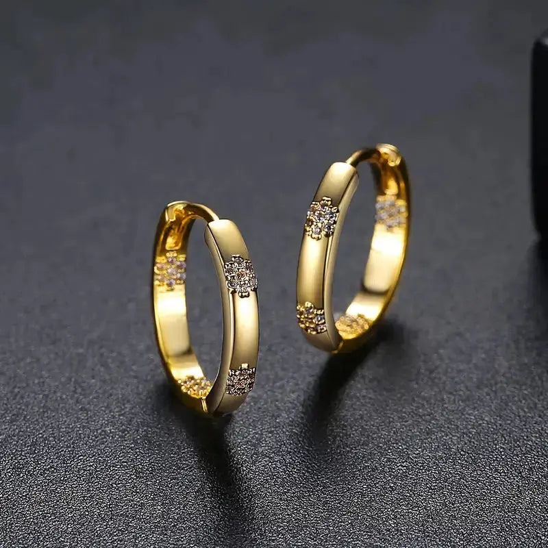 Boucles d'oreilles vintage rondes avec fleur dorée
