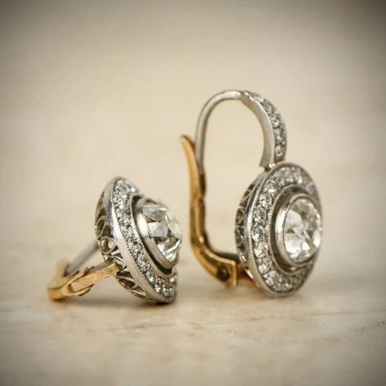 Boucles d'oreilles vintage en or et argent avec cristaux