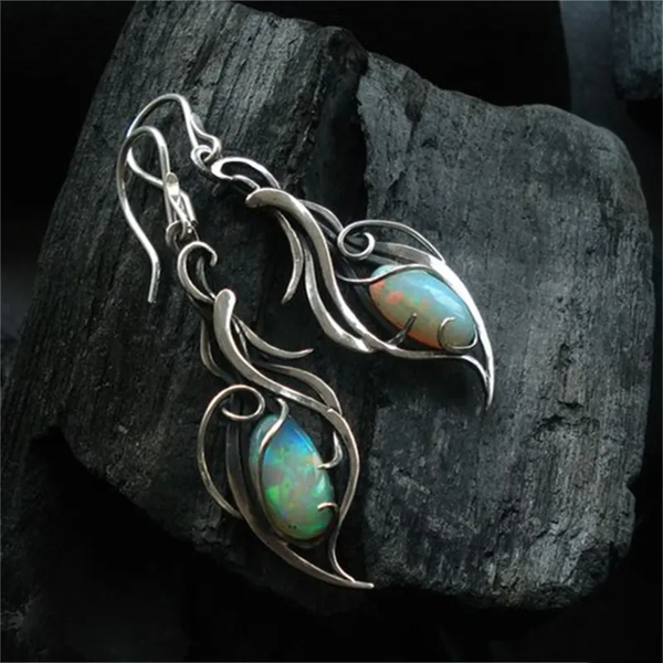 Boucles d'oreilles vintage en argent avec opale bleue