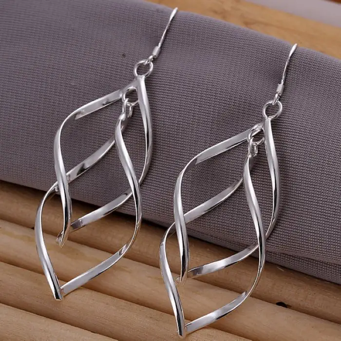 Boucles d'oreilles pendantes vintage en argent creux